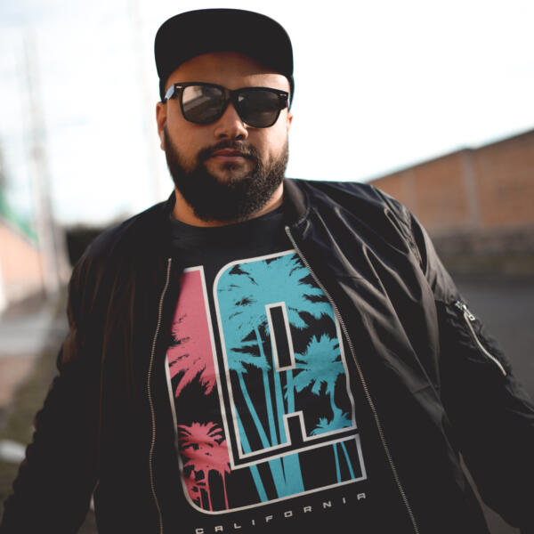 Man wearing Black LA California t-shirt.